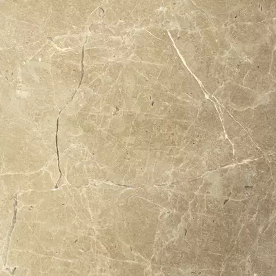 Close-up Emperador Light: light brown marble with irregular white veins and darker undertones. Features a smooth surface with a soft sheen.