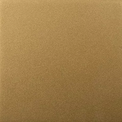 Close-up Gold Powder: fine and uniform surface in matte gold tones, with a slightly granular texture and a subtle shimmer.