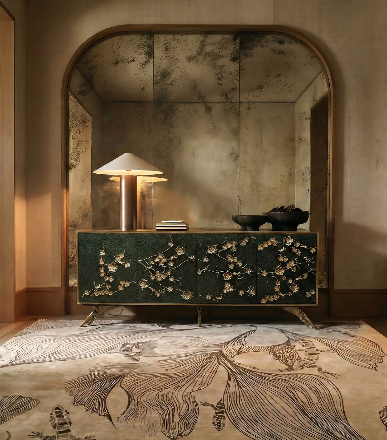KOKET luxury interior featuring the Spellbound Peacock Feather cabinet paired with the Flora Grey rug, styled beneath an arched niche with sculptural lighting.