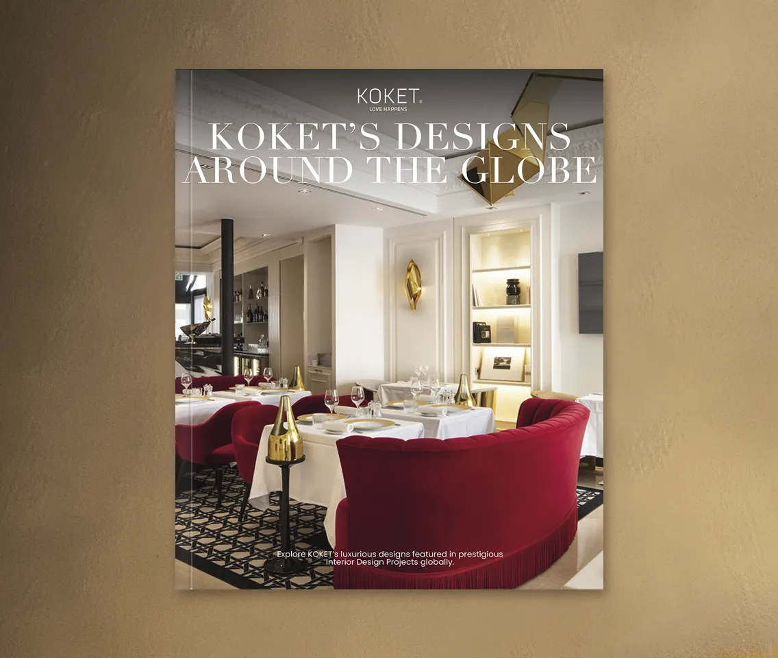 Koket catalog cover: KOKET's Designs Around the Globe, showcasing a luxurious interior with plush pink chairs and a striking tree artwork.