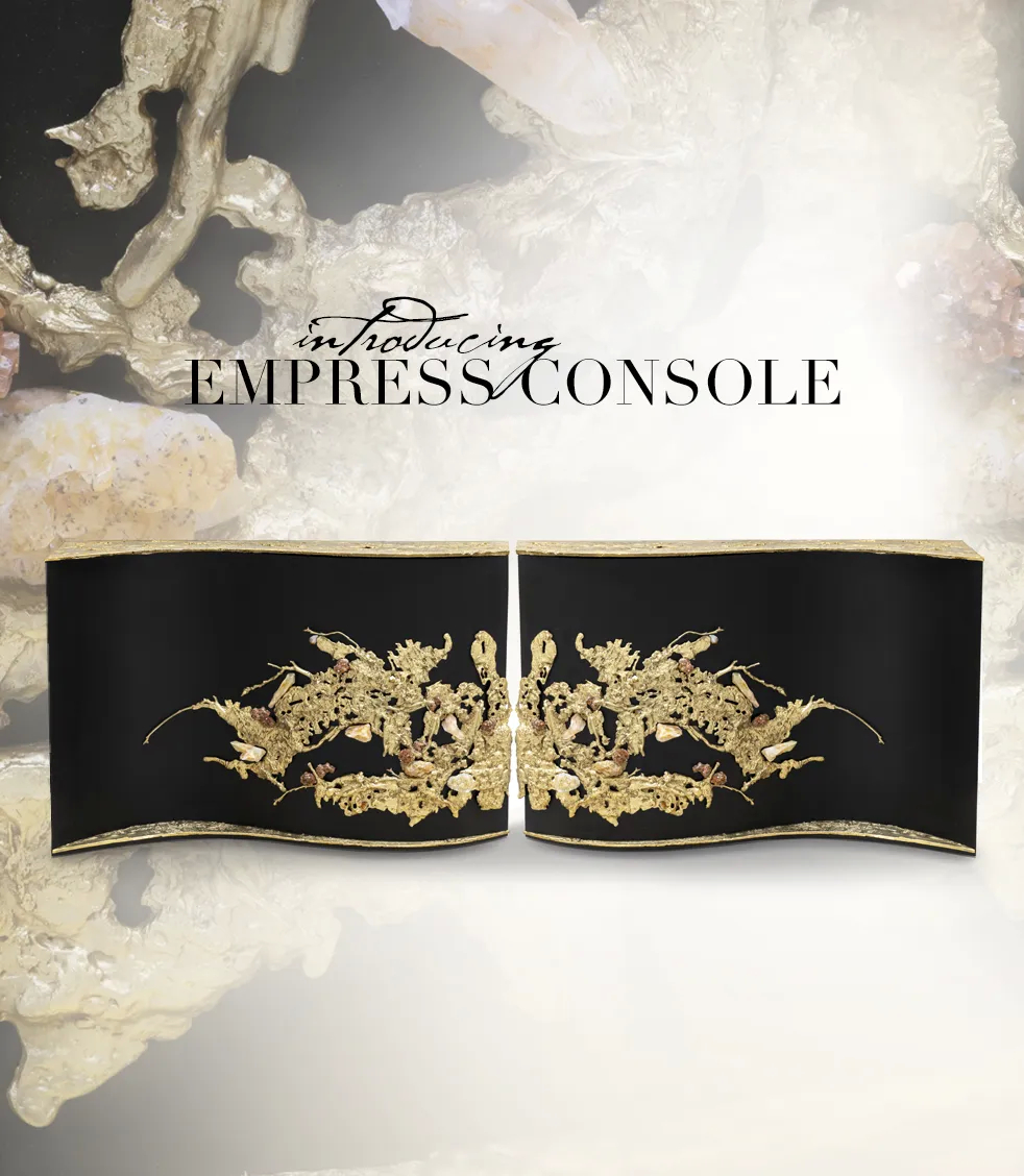 The Empress Console by KOKET, featuring black lacquer and intricate gold detailing, is presented with the text "Introducing Empress Console".