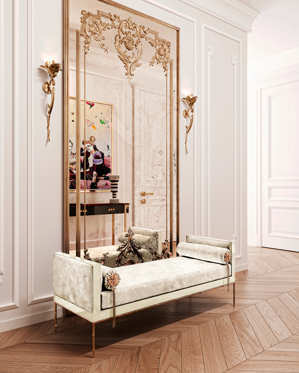 A luxurious Prive Daybed, upholstered in light cream fabric with gold legs and two bolsters, sits on a wooden parquet floor. Behind it,two decorative gold Flora Sconces are mounted on the white paneled wall on either side of the mirror.