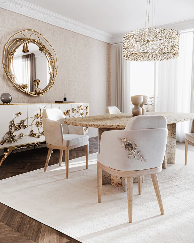 A chic dining room featuring a white Spellbound Cabinet, a round Stella Mirror, and an Eternity Chandelier.