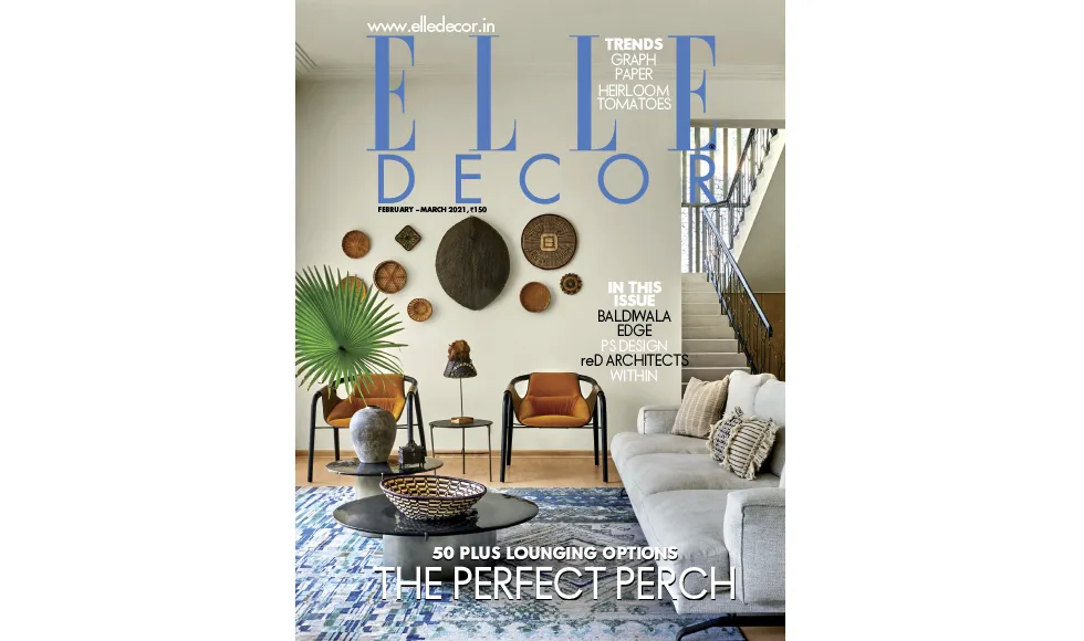 Press clipping: Elle Decor magazine cover featuring a living room with modern furniture and wall decor.