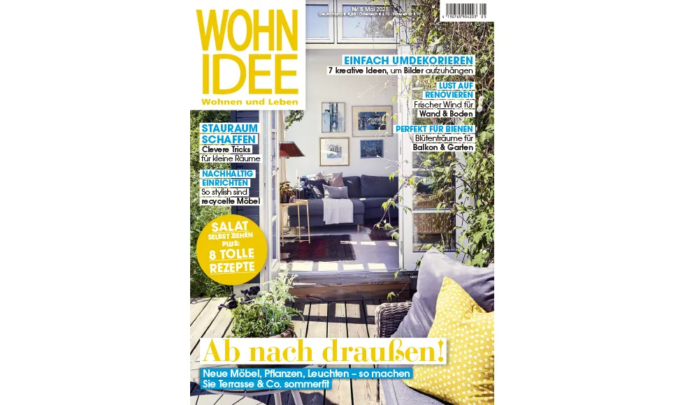 Wohnidee magazine cover with a cozy living room featuring a floral sofa, coffee table, and various decor items.