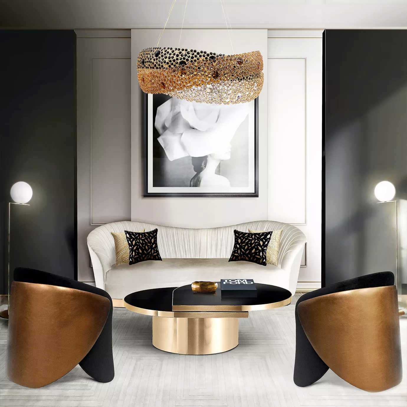 The Trinity Chandelier illuminates a stylish living room with a white sofa, black coffee table, and bronze chairs.