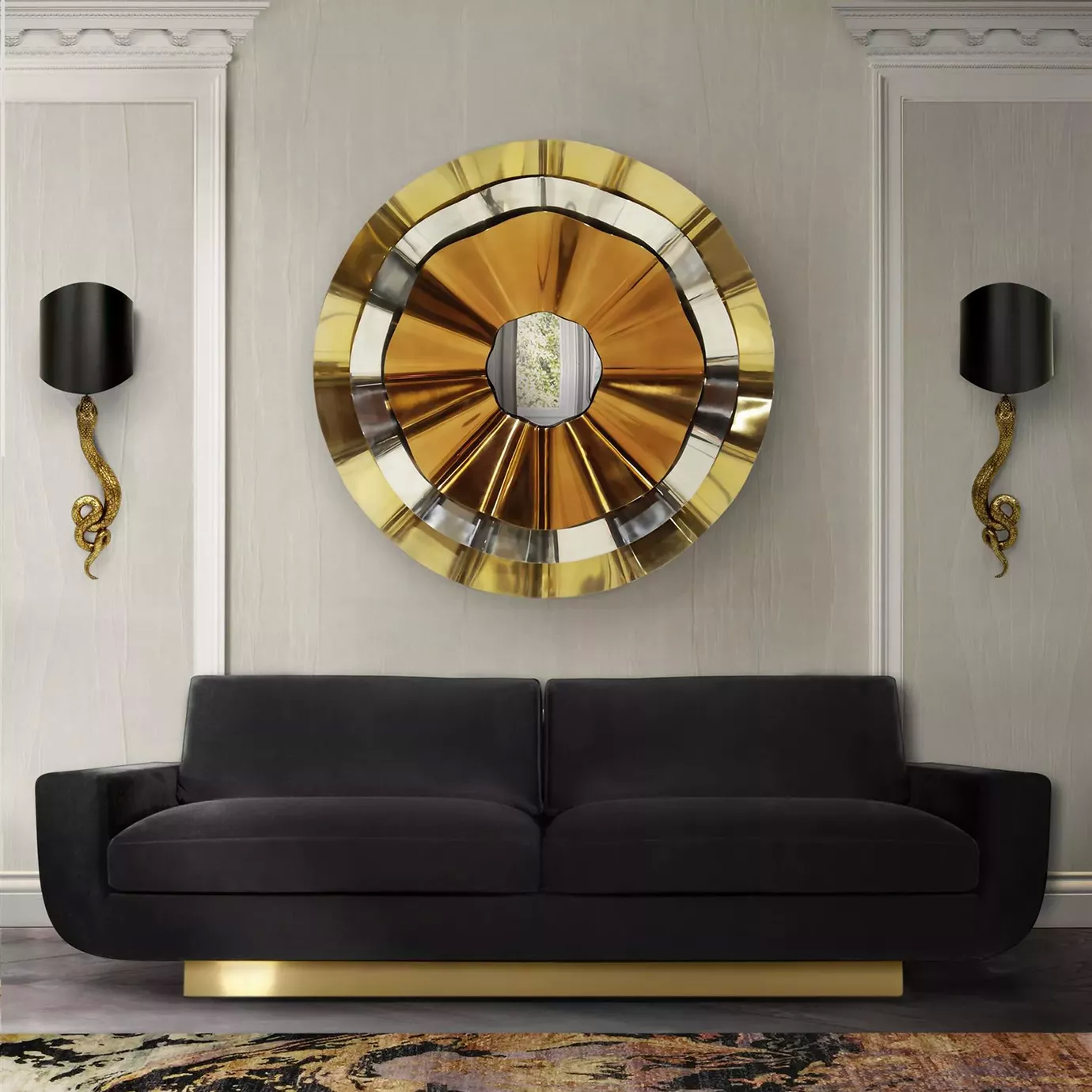 A luxurious living room features a dark gray sofa, an ornate gold mirror, and two gold Serpentine Sconces.