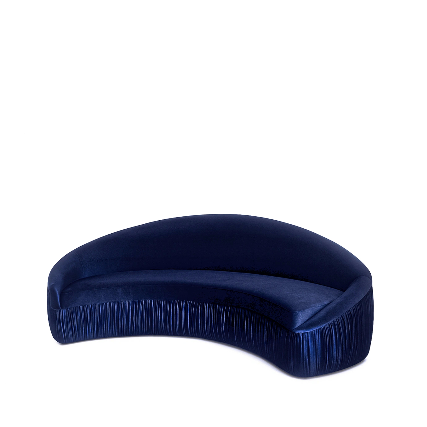 Vamp Full Upholstery Sofa in curved navy blue velvet with fringe detail, featuring a smooth rounded back and seat in a luxurious, modern interior setting.