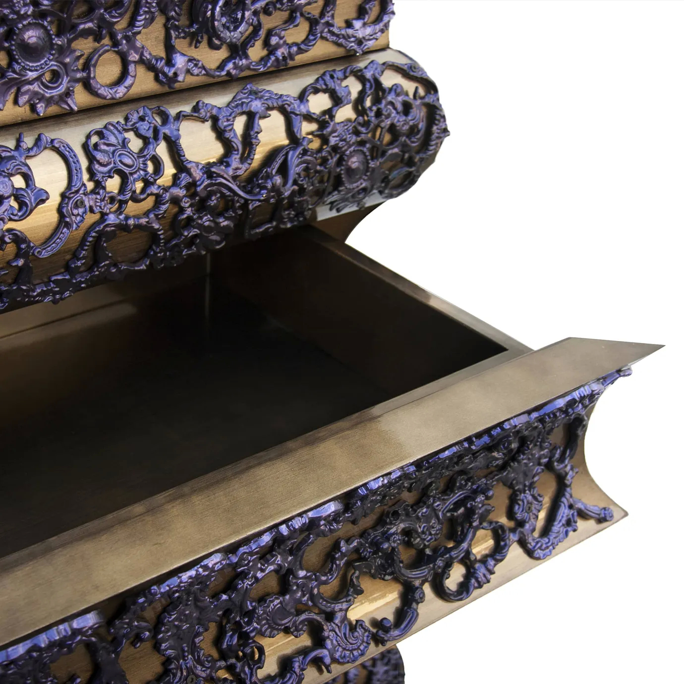 Gold chest with hammered texture and crochet pattern, shown with one drawer open to reveal interior.