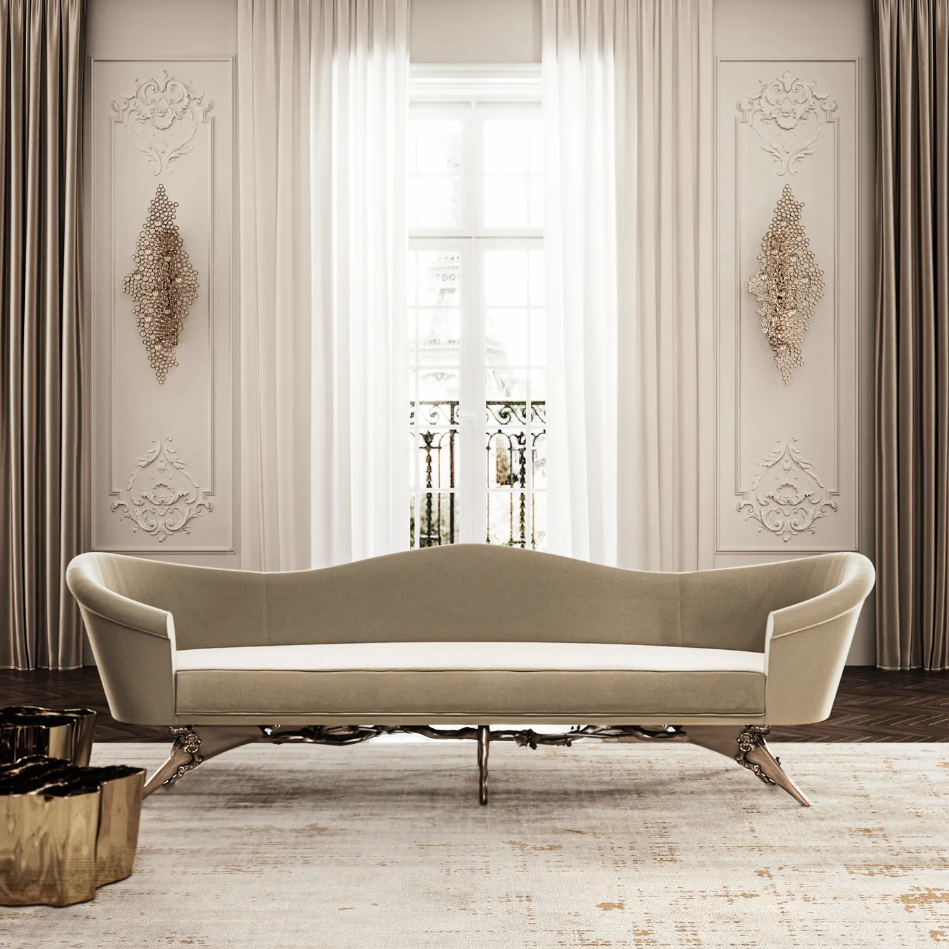 A elegant Colette Floral Metal Base Sofa in a beige tone sits in a lavish room with white walls, ornate moldings, and tall windows.