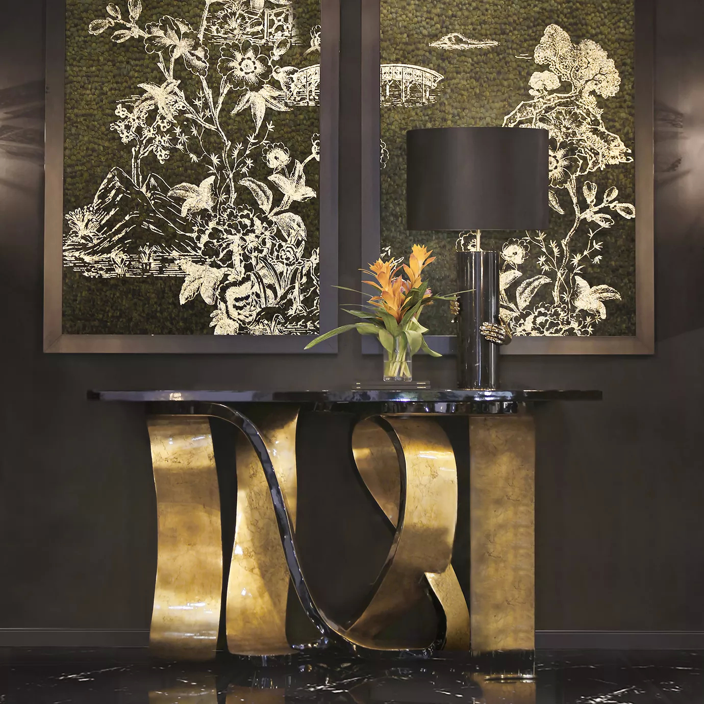 A luxurious living room features a Ribbon Broken Gold Leaf Console by Koket with a table lamp and floral arrangement.