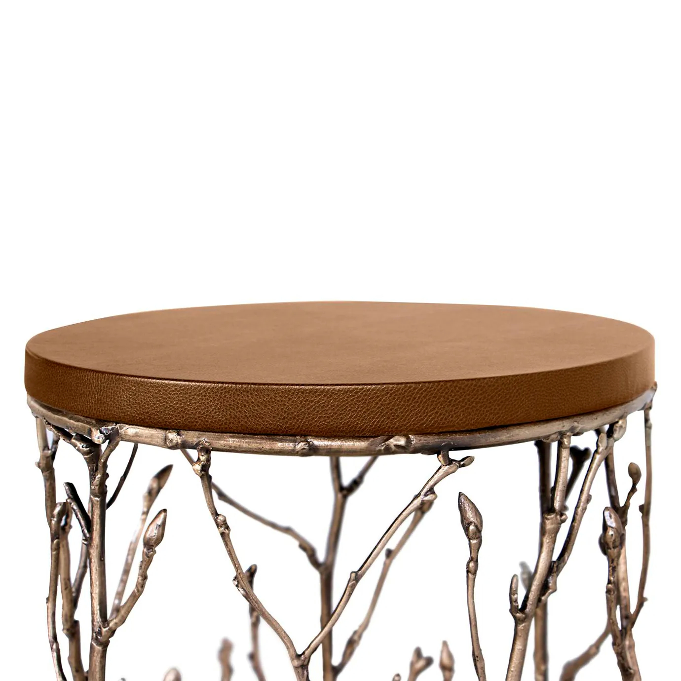 A close-up of the Enchanted Synthetic Leather Side Table highlights its brown leather top and intricate antique gilded branch base.