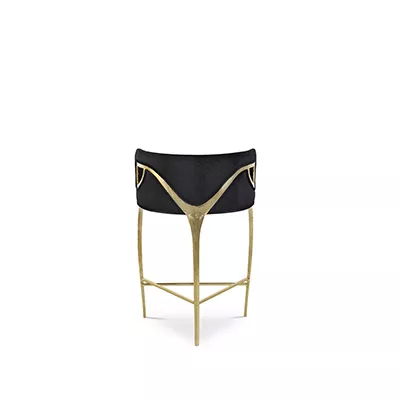 Chandra Counter Stool seen from the back, highlighting its elegant golden structure against the black upholstery.
