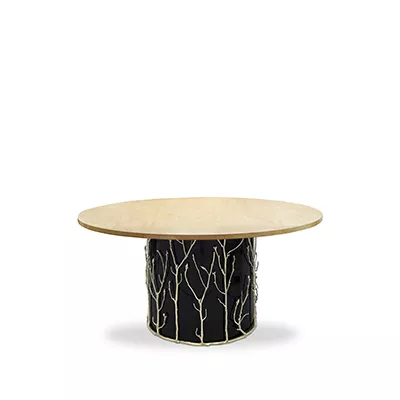 Featuring a Birds Eye Veneer tabletop, the Enchanted Birds Eye Veneer Top Dining Table has a black structure adorned with intricate aged brass details, resembling branches.