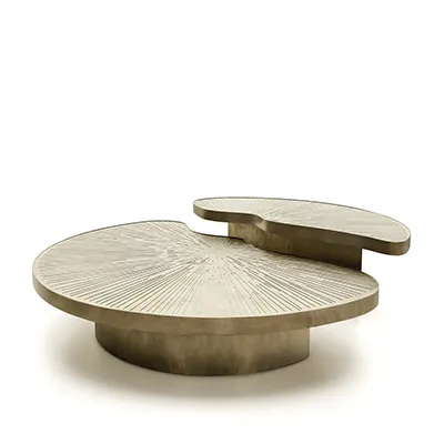 Myth Coffee Table features two individual aged brass parts, in copper hues, that can be set in different positions and form a round shape. The tabletop is engraved on top.