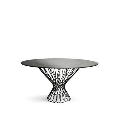 Allure Dining Table: Sophisticated smoked glass top resting on the interlaced black silhouette-shaped structure.