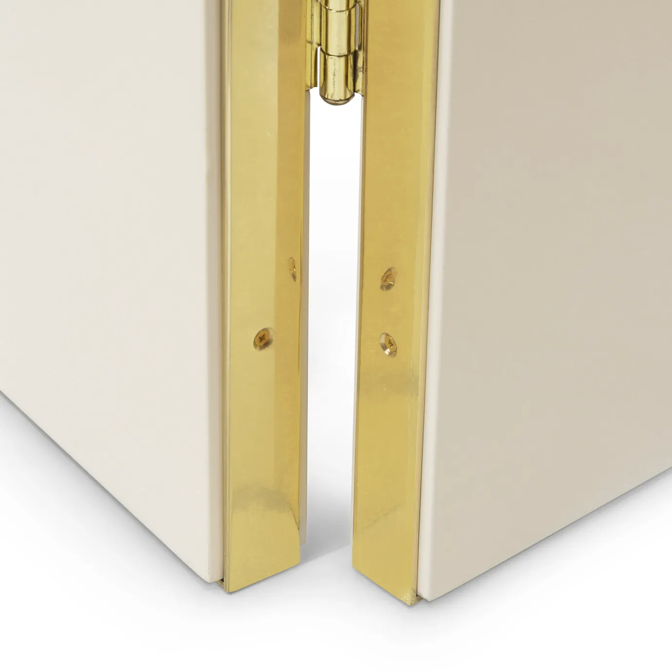 Close-up of one of KOKET’s signature gold filigree butterflies on the Euphoria Screen, showcasing intricate metalwork and texture.