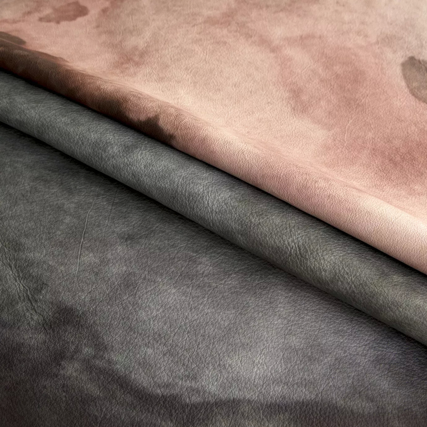 Layered Watermark Terra Leather, showing its textured surface with blended watercolor tones of brown, beige, pink, and gray.