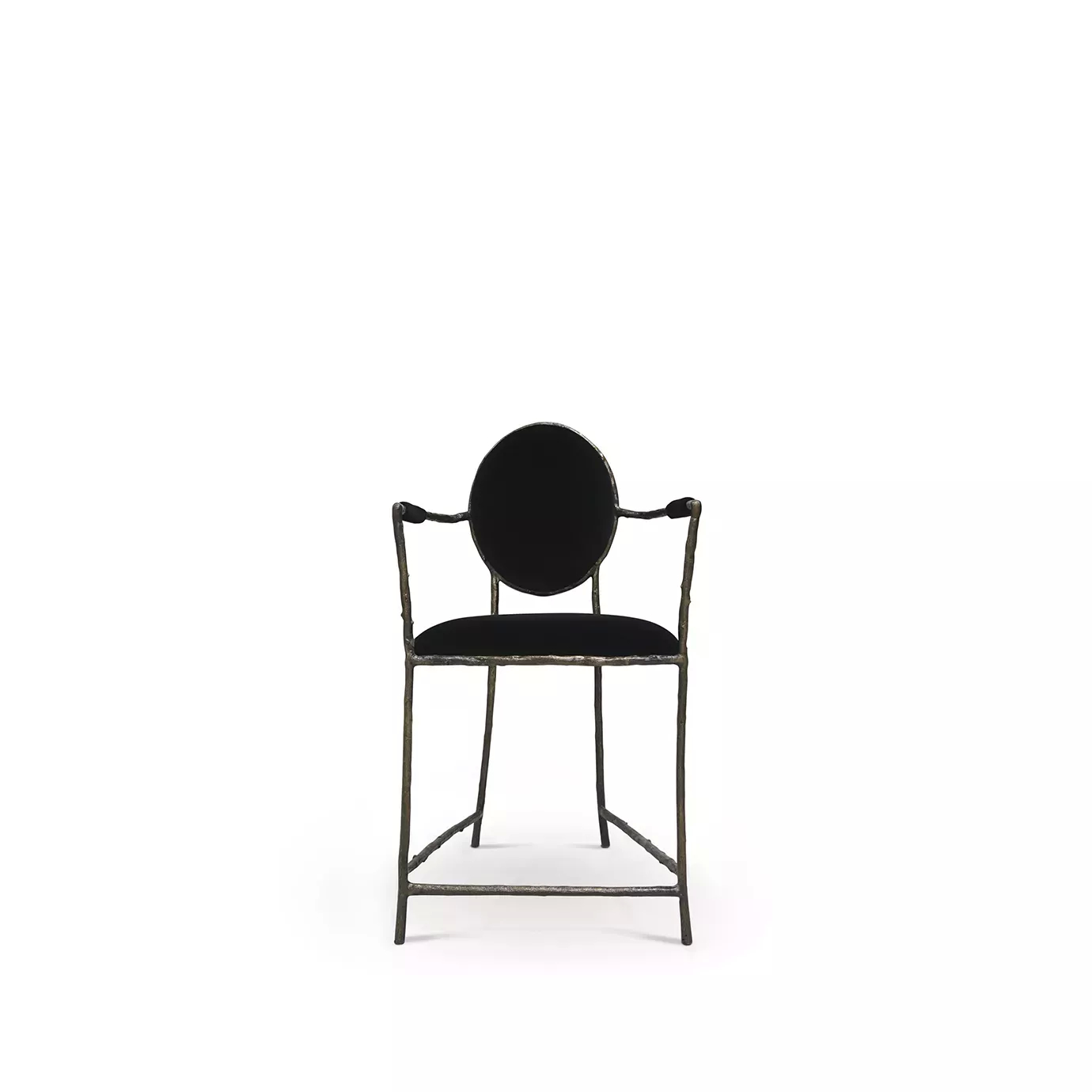 Enchanted Counter Stool features an aged brass frame resembling branches and luxurious black upholstery.