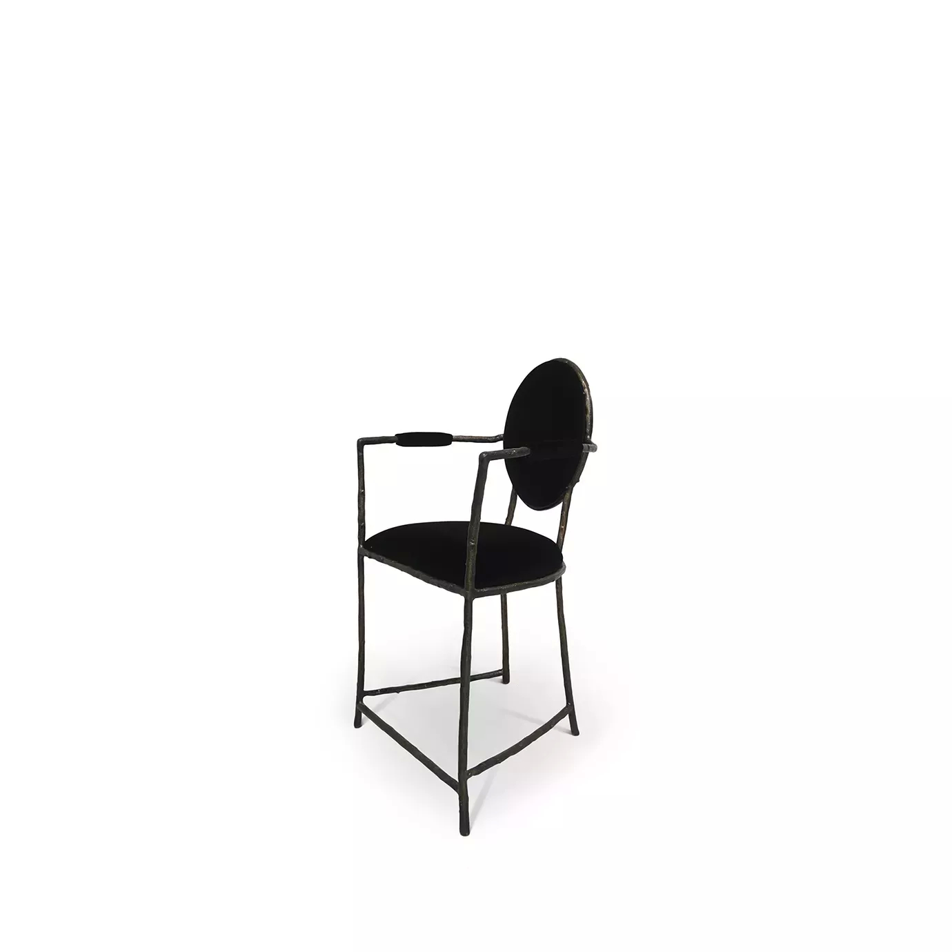 Side view of the Enchanted Counter Stool, showcasing its aged brass frame resembling branches, combining with the luxurious black upholstery.