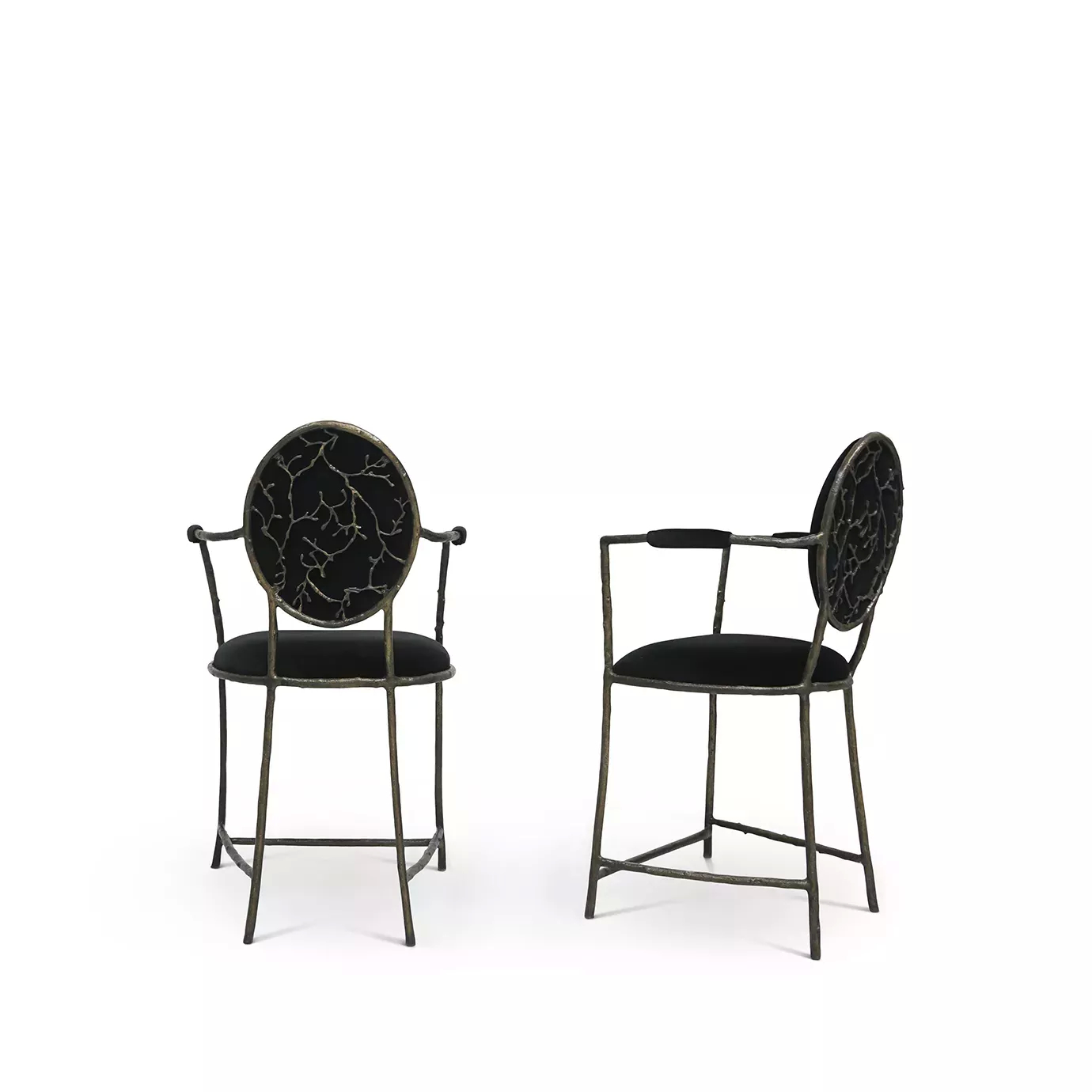 Two Enchanted Counter Stool, showcasing its elegant backrest that resembles branches, combining with the elegant black upholstery.