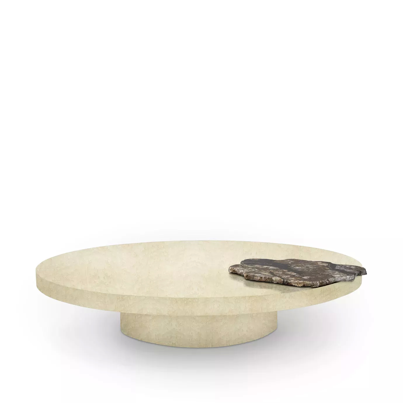 The Mineral Coffee Table features a round, light-colored stone base and a contrasting, irregularly shaped dark stone accent.