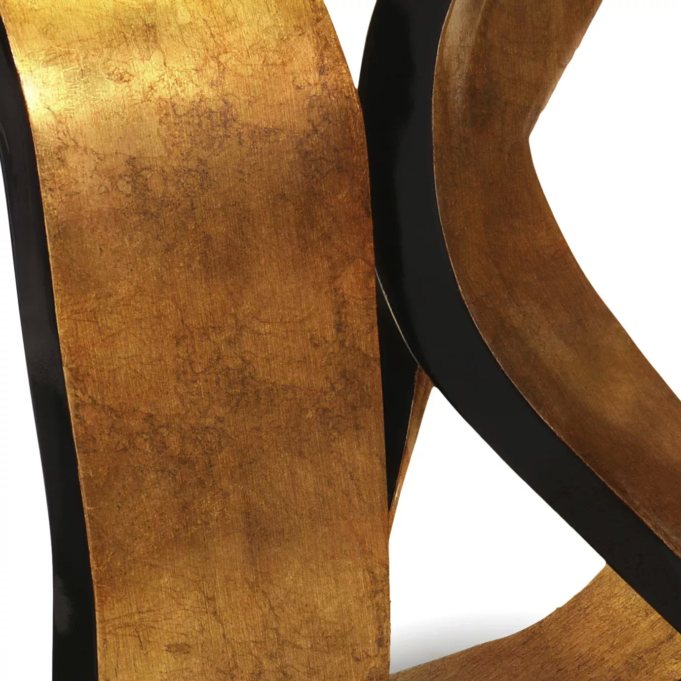 Close-up of the Ribbon Broken Copper Leaf Dining Table's base, showing the texture of the copper leaf ribbons and the dark inner structure.
