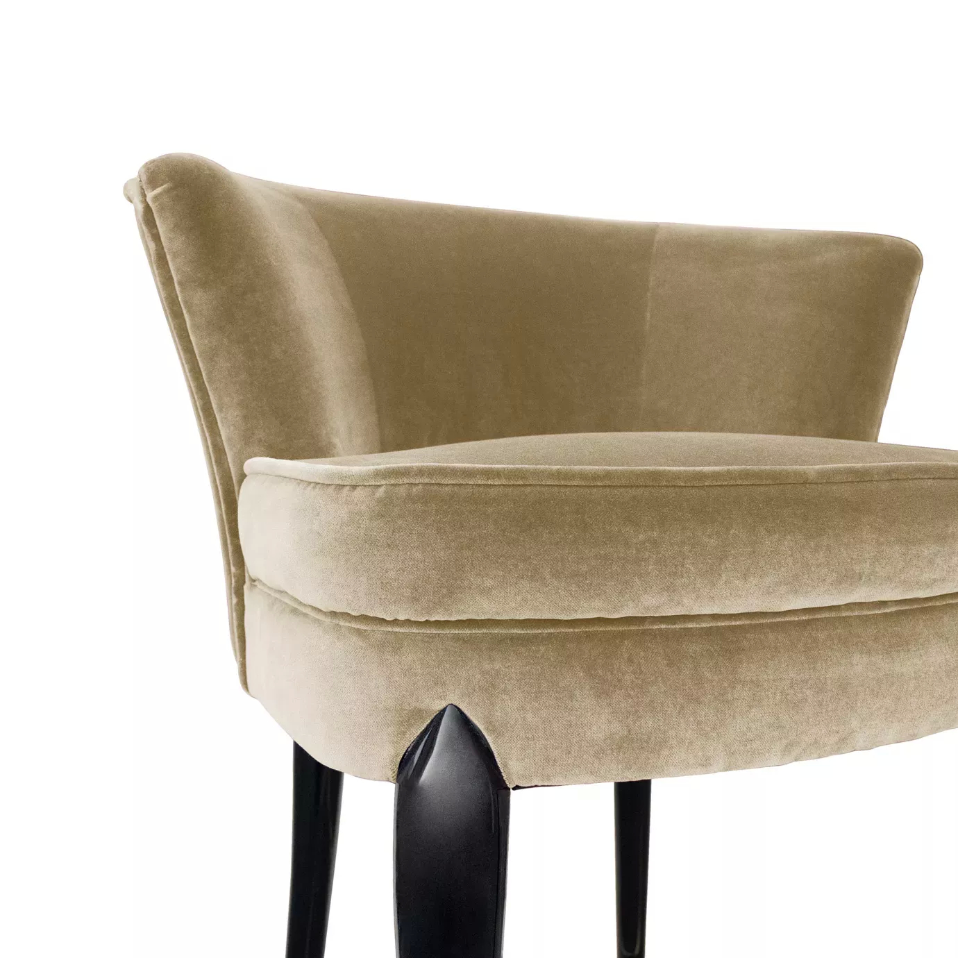 Tight shot of the Délice Counter Stool, highlighting its soft tan velvet fabric and glossy black leg detail.