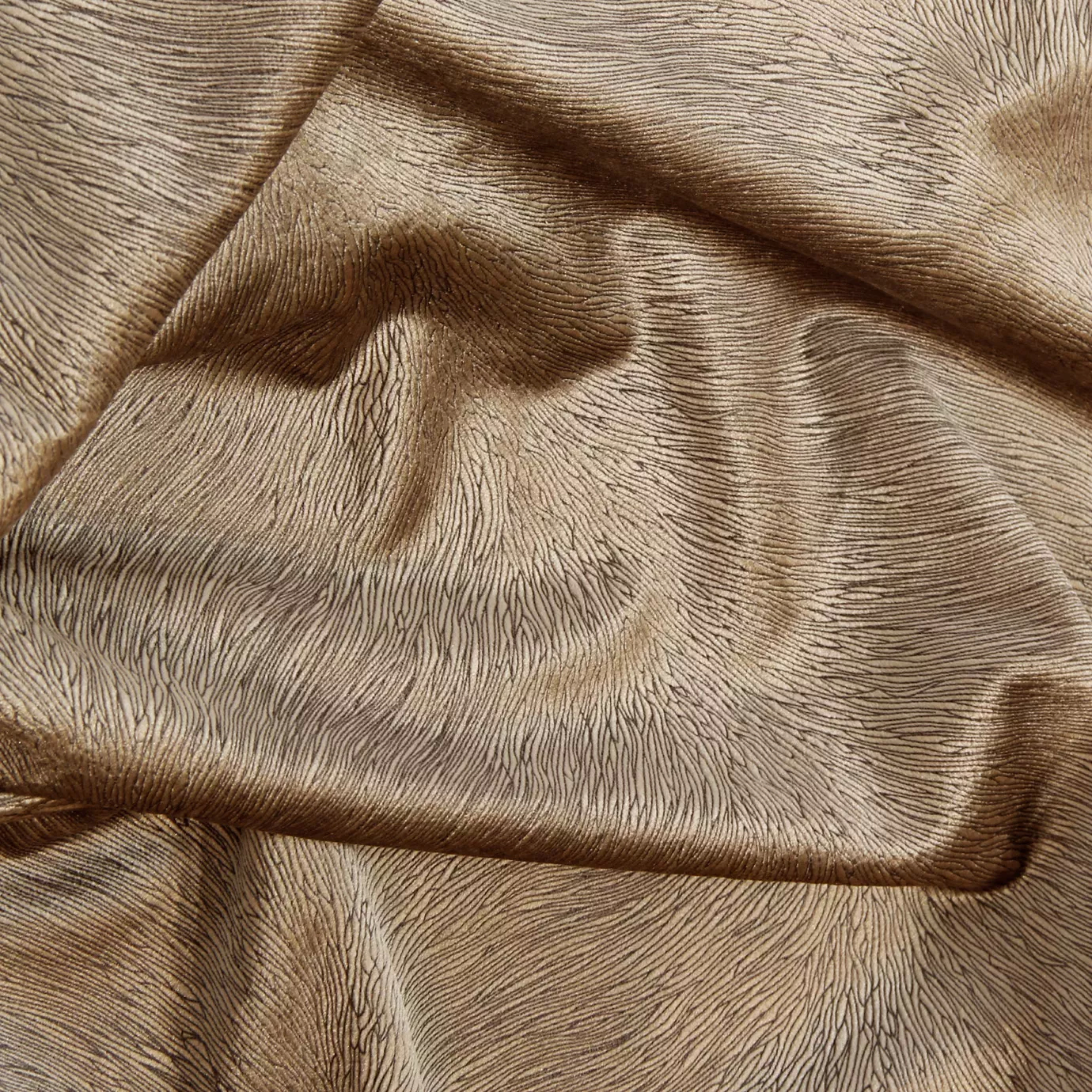 Hide Velvet Fabric with a rich, textured pattern and warm tone, showcasing its luxurious texture and elegance.