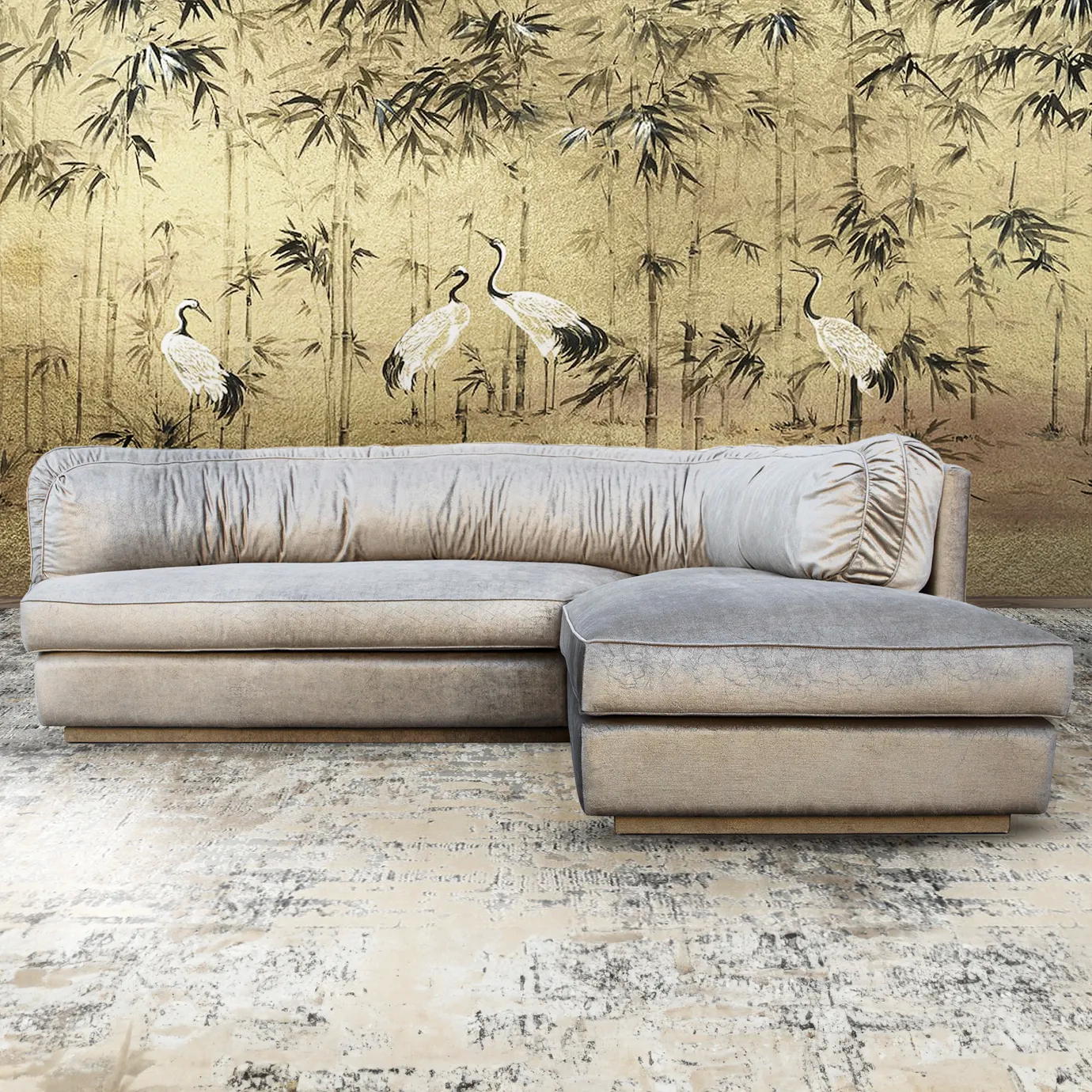 Elegant Lisboa Sofa with chaise in a stylish room featuring a gold bamboo and crane wallpaper. The plush velvet sectional offers luxurious comfort.