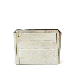 Side view of the glamorous Tamara Chest, featuring mirrored panels with a subtle antique finish and three spacious drawers. Its design adds a touch of elegance.