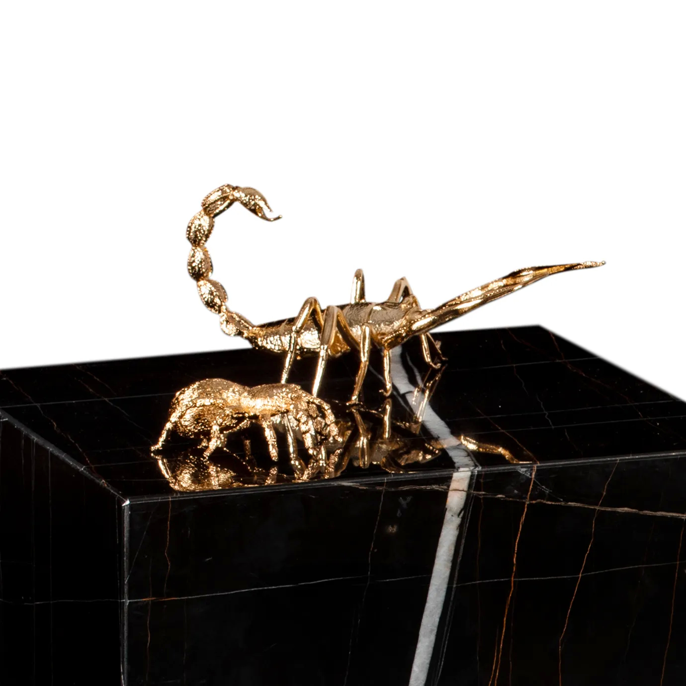 Golden scorpion and beetle sculptures grace a black marble Metamorphosis Side Table.