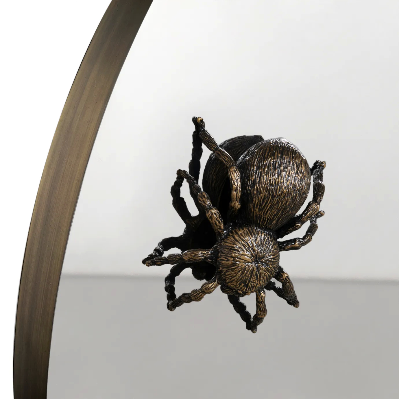 Close-up of Metamorphosis Console, showcasing the detailed spider-inspired design and sculptural craftsmanship.