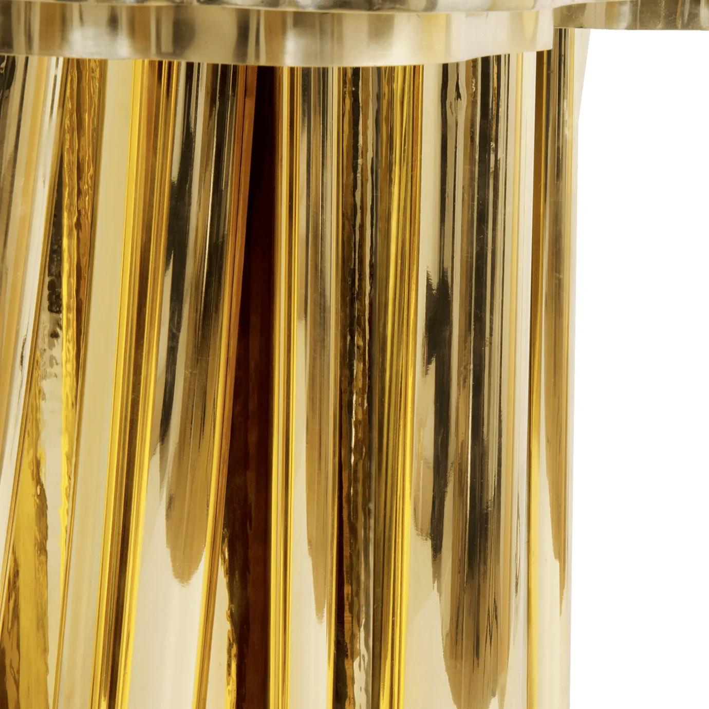 Close-up of Fortuna Dining Table, highlighting the seamless connection between its golden base and top.