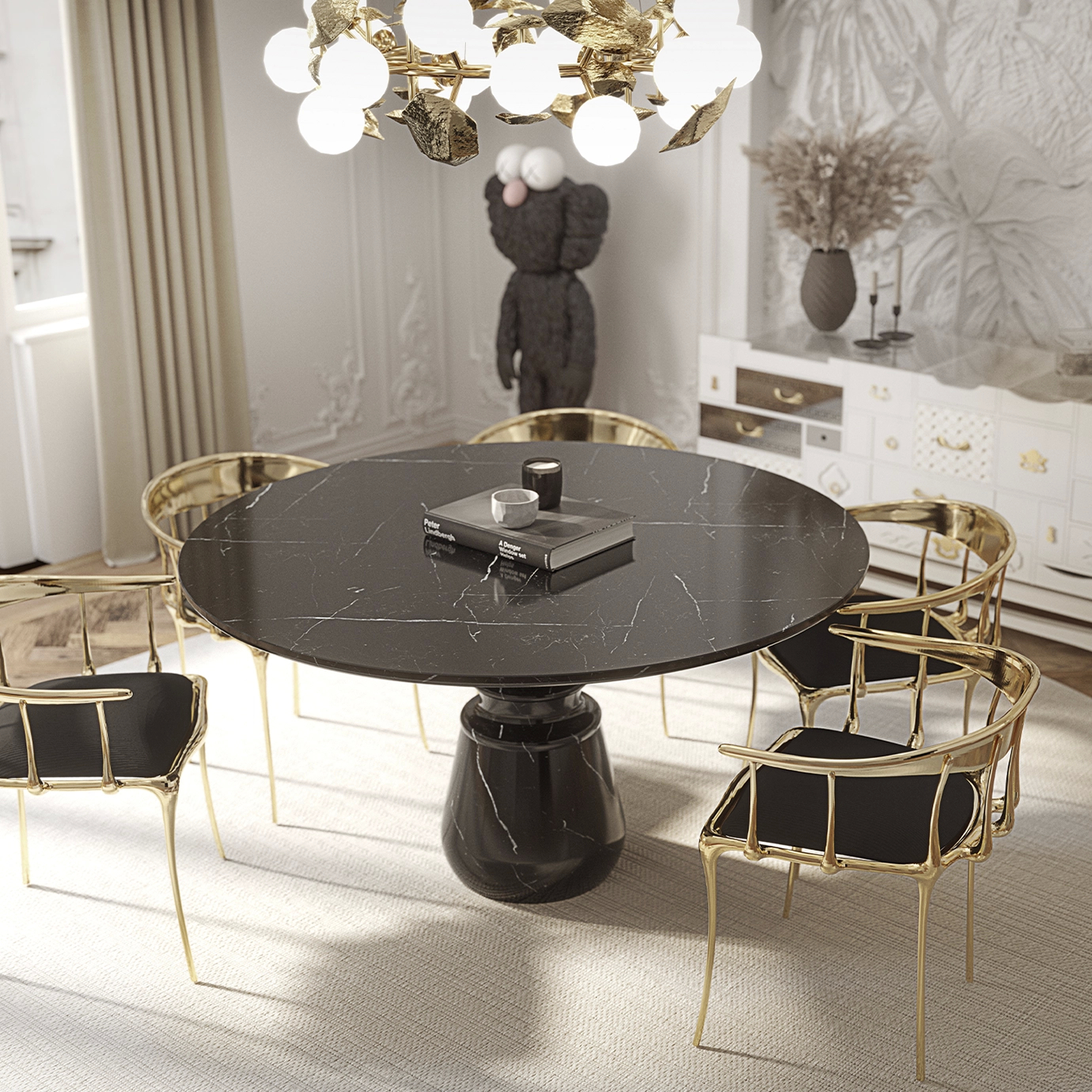 Luxurious Pietra Round Dining Table with elegant gold accents and a striking black marble top.