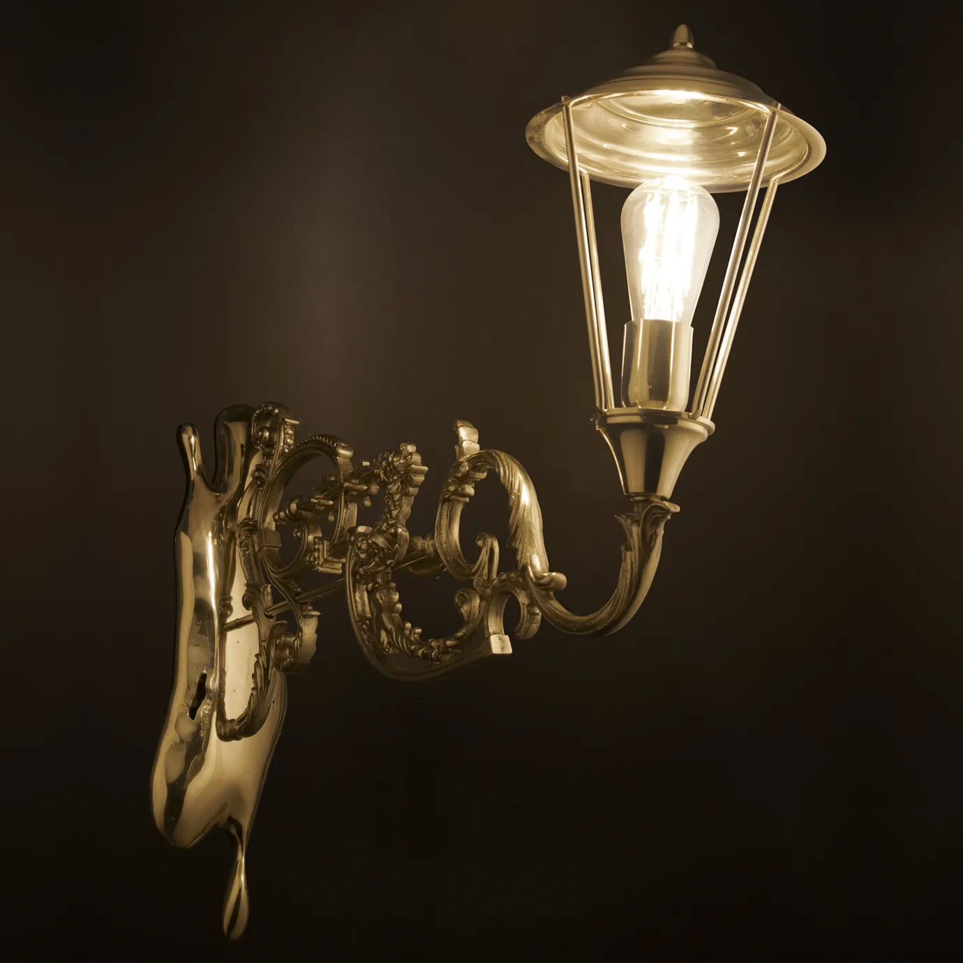 Close-up detail of the Lumiere Wall Lamp’s metal base and glass shade, showcasing clean lines and refined craftsmanship in minimalist lighting design