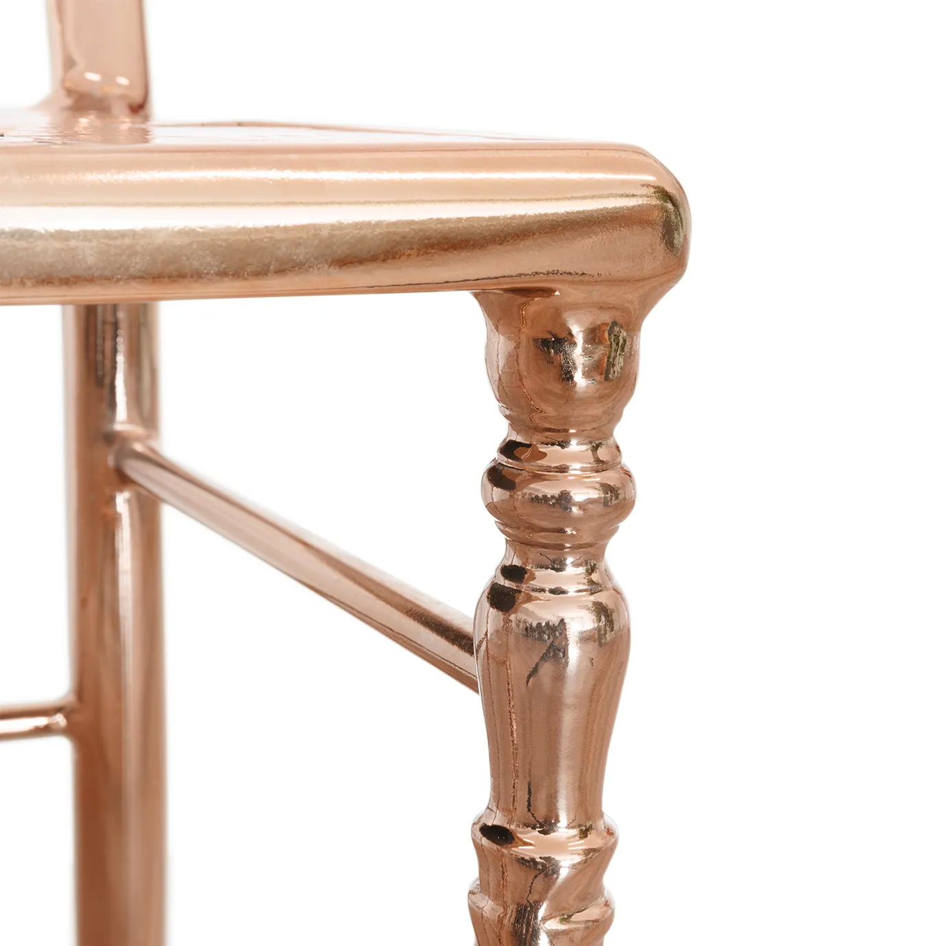 Elegant copper chair with a sleek, modern design and a stylish, curved backrest for added sophistication.
