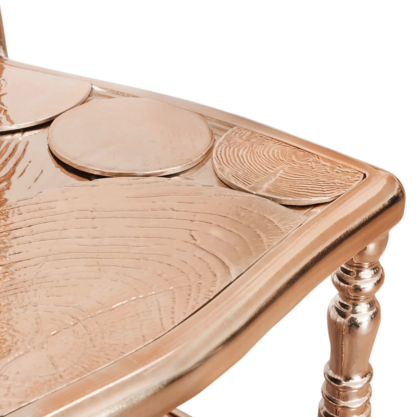 Sophisticated copper chair with a sleek design, featuring a curved backrest and luxurious metallic finish.