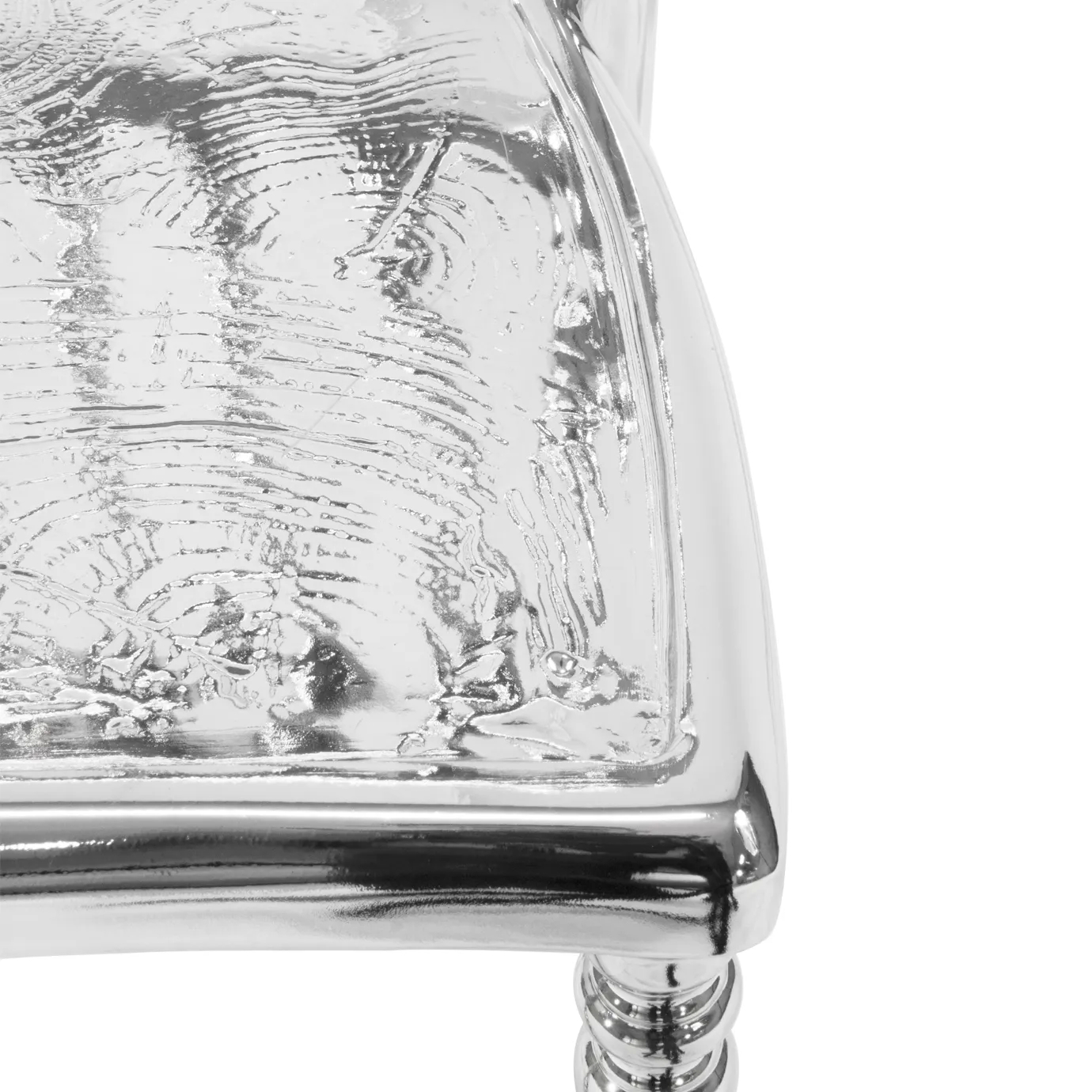 Elegant chair with a modern design, featuring a curved backrest and luxurious, plush upholstery.