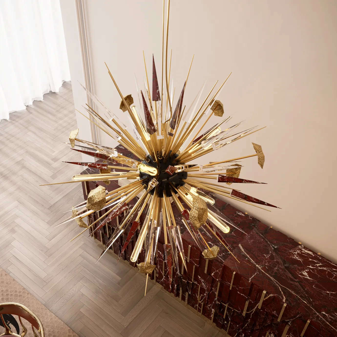 Detailed view of the Outburst Chandelier by Boca do Lobo, focusing on the intricate texture of the gold-plated brass spikes and the contrast with the black central core.
