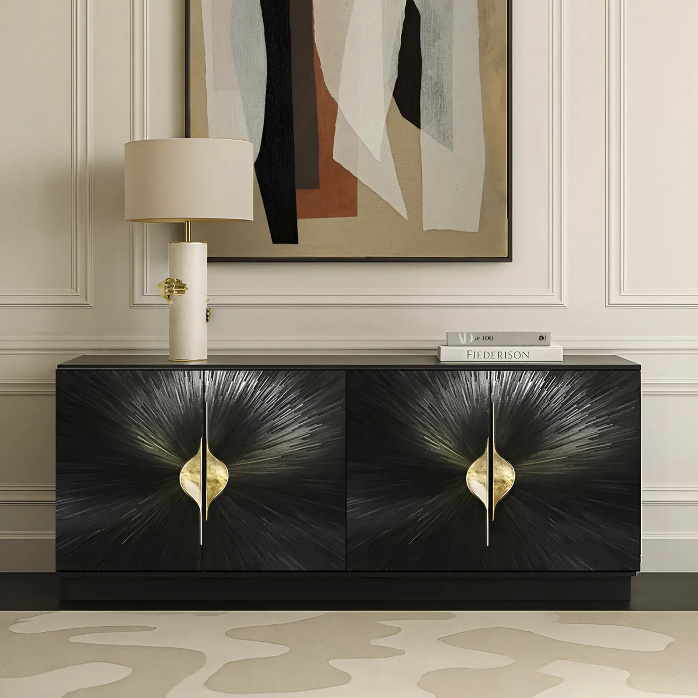 A luxurious Celine Straw Cabinet, black with gold pulls, under an abstract painting, flanked by a Vengeance Table Lamp.