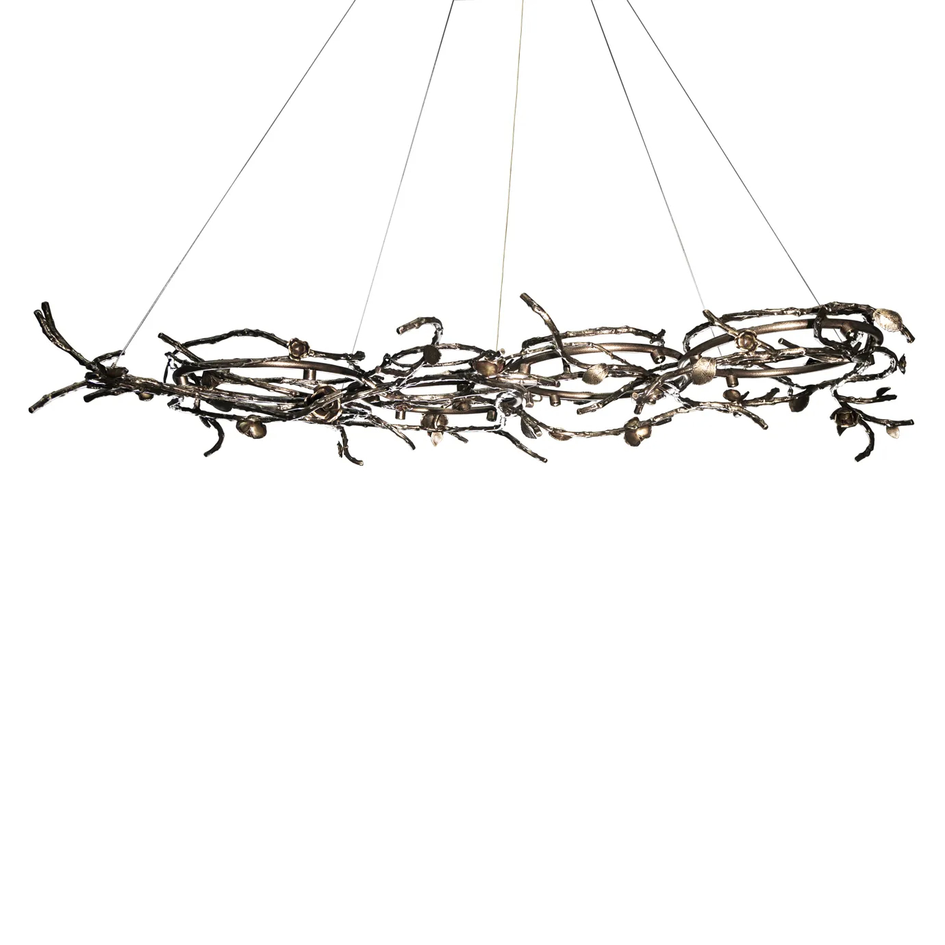 Rose Chandelier in aged brass with sculptural vine-like branches and delicate bud details, suspended by thin cables in a modern interior setting.
