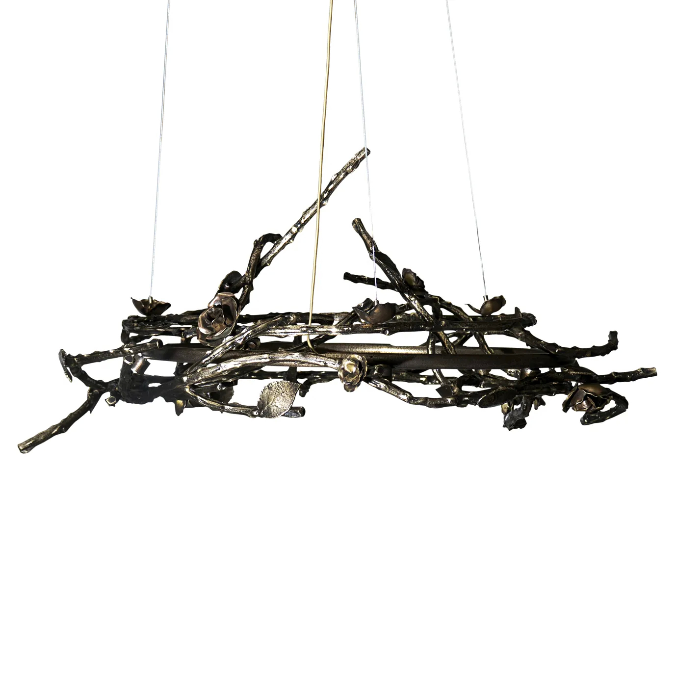 Rose Round Chandelier in aged brass with sculptural branches, metallic leaves, and rose-shaped accents, suspended by thin wires in a modern interior.