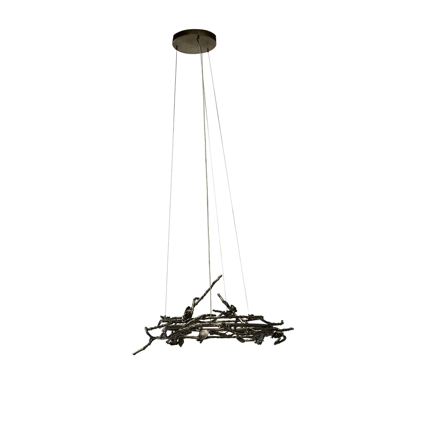 Rose Round Chandelier in aged brass with sculptural branches, metallic leaves, and rose-shaped accents, suspended by thin wires in a modern interior.