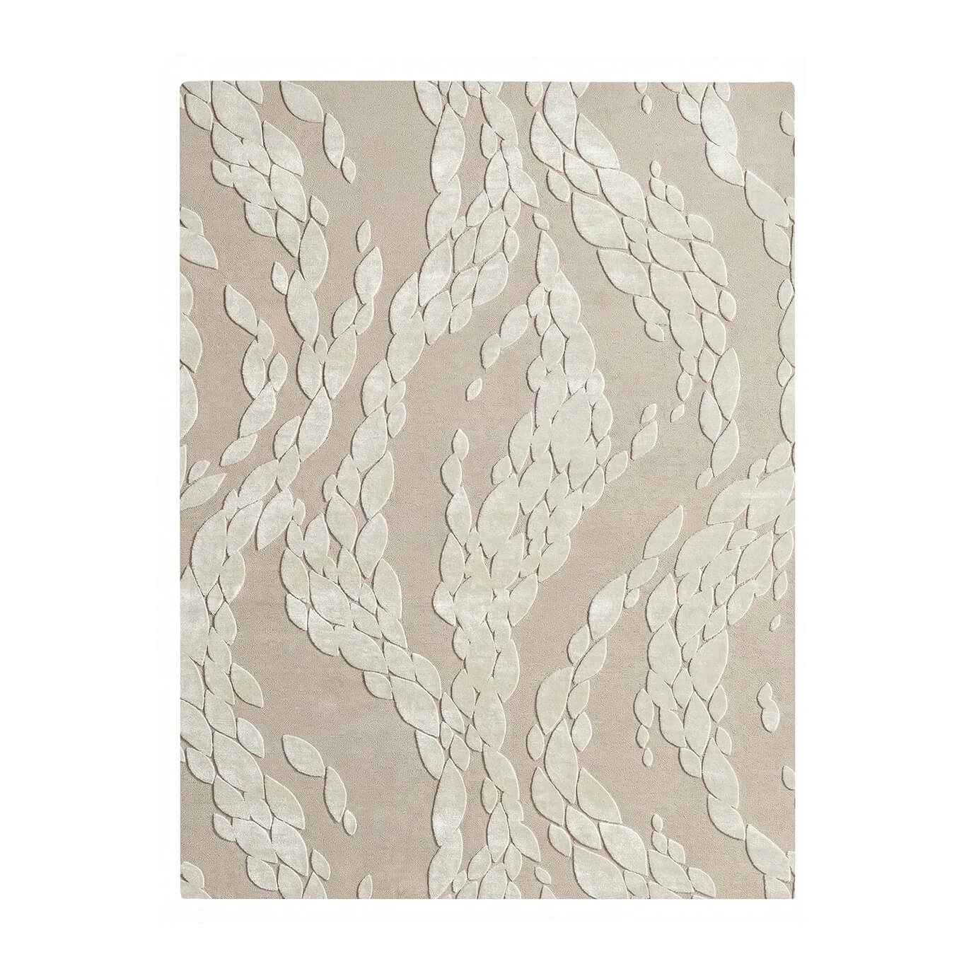 Full view of a neutral KOKET luxury rug featuring a contemporary leaf motif with hand-tufted relief textures in a tonal cream palette.