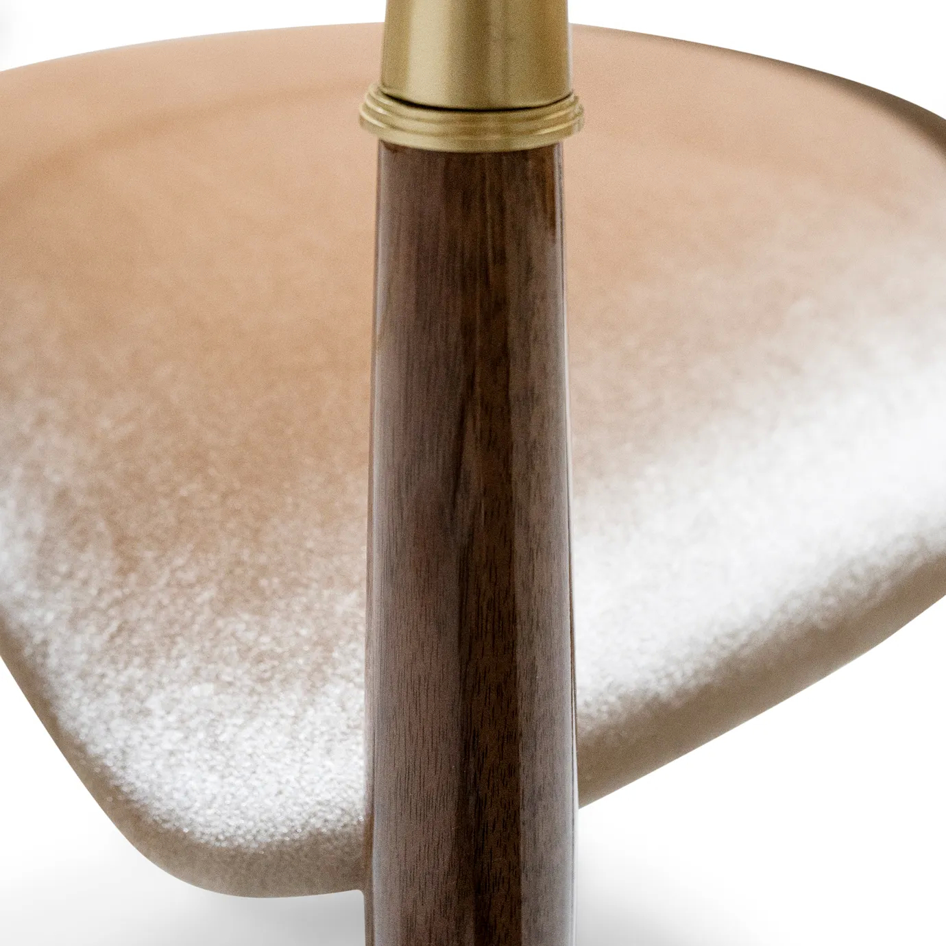 Nahéma Chair by KOKET hand-carved walnut leg showing natural wood grain and brass collar handcrafted in Portugal