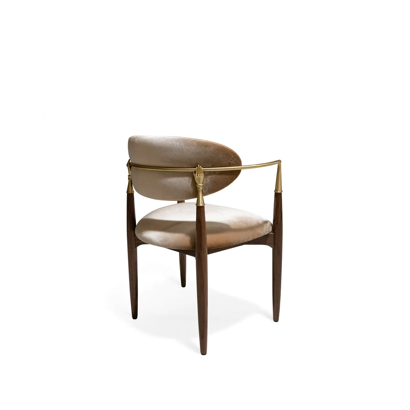 Nahéma Chair by KOKET three-quarter back view showing oval backrest, two cast brass hand details and walnut tapered legs