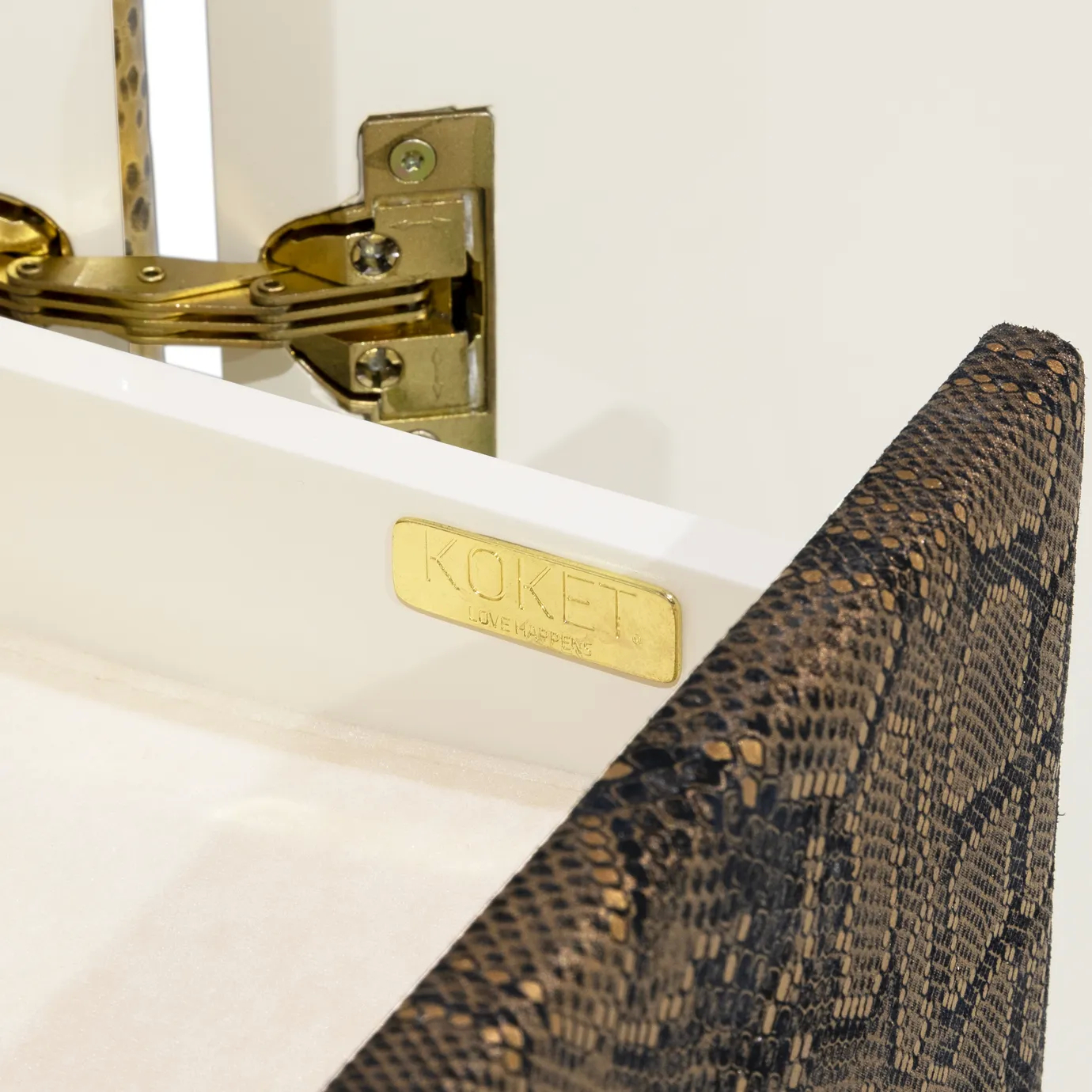 Close-up of exotic leather detail on Opium Cream Cabinet with textured surface