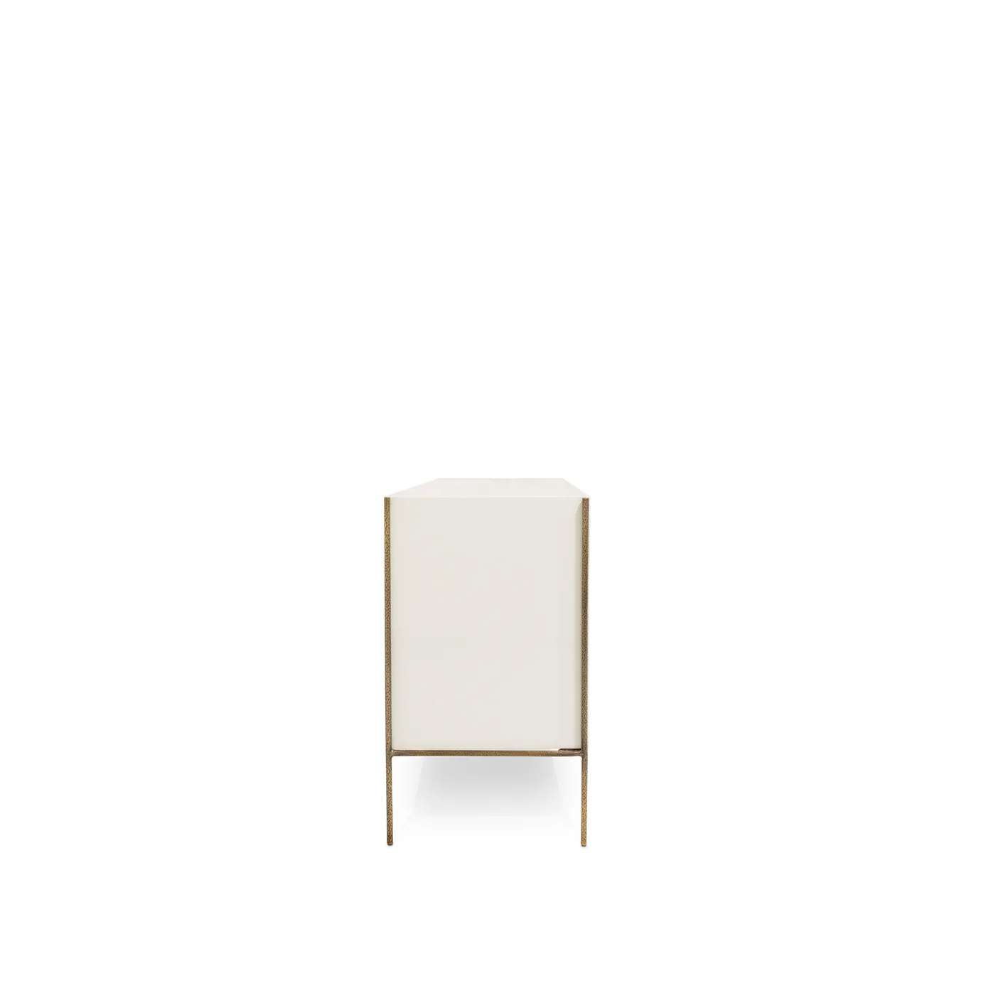 Side view of Opium Cream Cabinet highlighting lacquer finish and slender brass structure