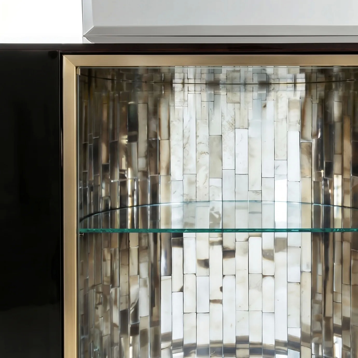Glass mosaic interior on Florence bar cabinet by KOKET, mirrored tesserae in silver and smoke tones with curved glass shelf.